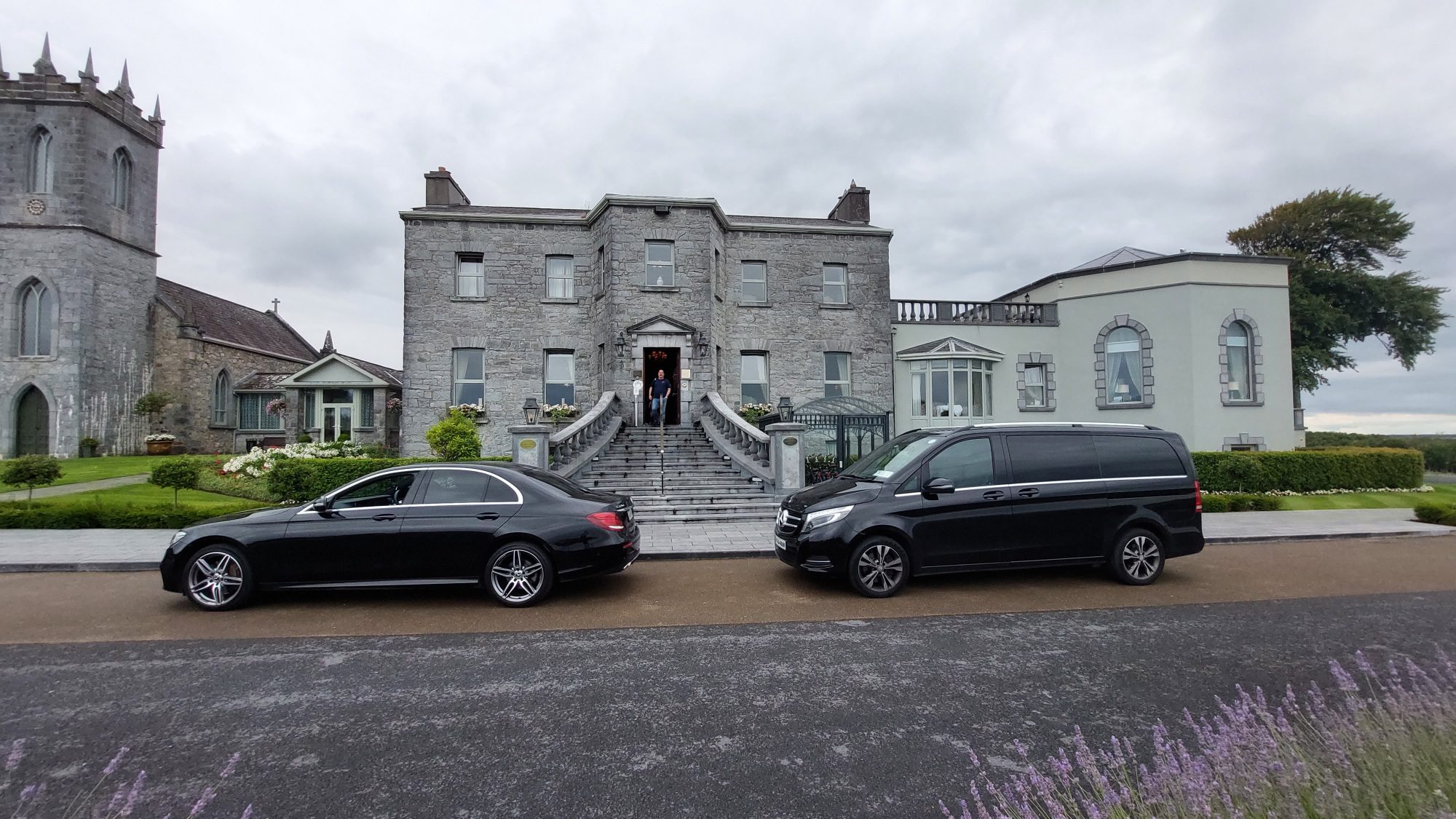 two-black-mercedes-benz-outside-glenlo-abbey-estate-galway-private-car-service